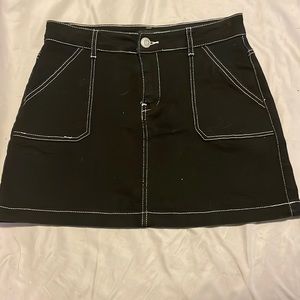 Black denim mini skirt